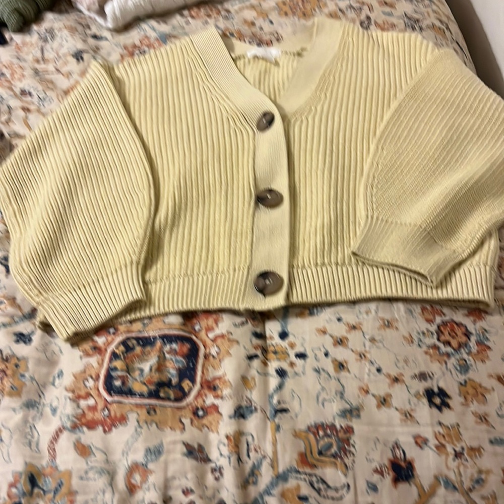 Soft light yellow cardigan from H&M.